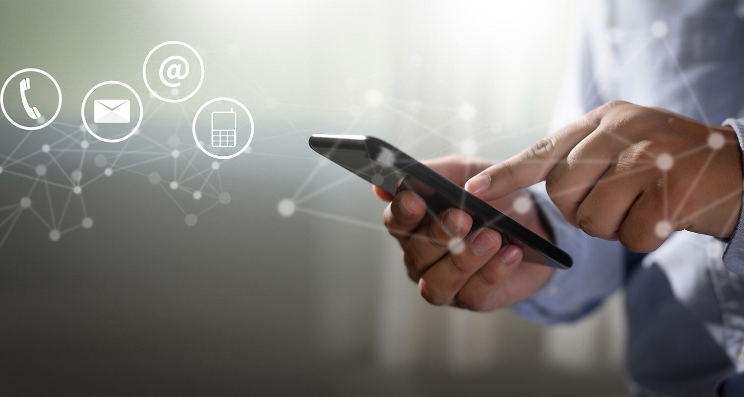 A person using a calculator app on a smartphone